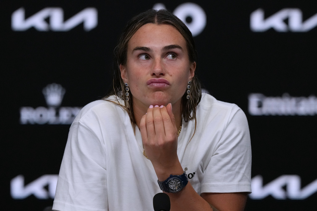 FILE -Aryna Sabalenka of Belarus reacts during a press conference following her loss to Elena Rybakina of Kazakhstan in the women's singles final at the Australian Open tennis championship in Melbourne, Australia, Jan. 31, 2026. (AP Photo/Aaron Favila), File)