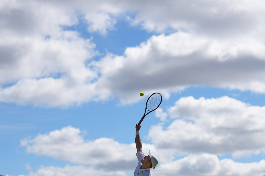Otto Virtanen of Finland serves during the second round men's singles match against Arthur Fery of Britain at the Wimbledon Tennis Championships in London, Thursday, July 2, 2026.(AP Photo/Kin Cheung)