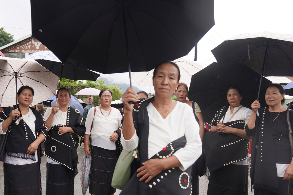 Ahisha Magh, 62, participates in a protest against rising cases of sexual violence against women and demanding justice for victims, in Kohima, capital of the northeastern Indian state of Nagaland, Friday, June 19, 2026. (AP Photo/Yirmiyan Arthur)