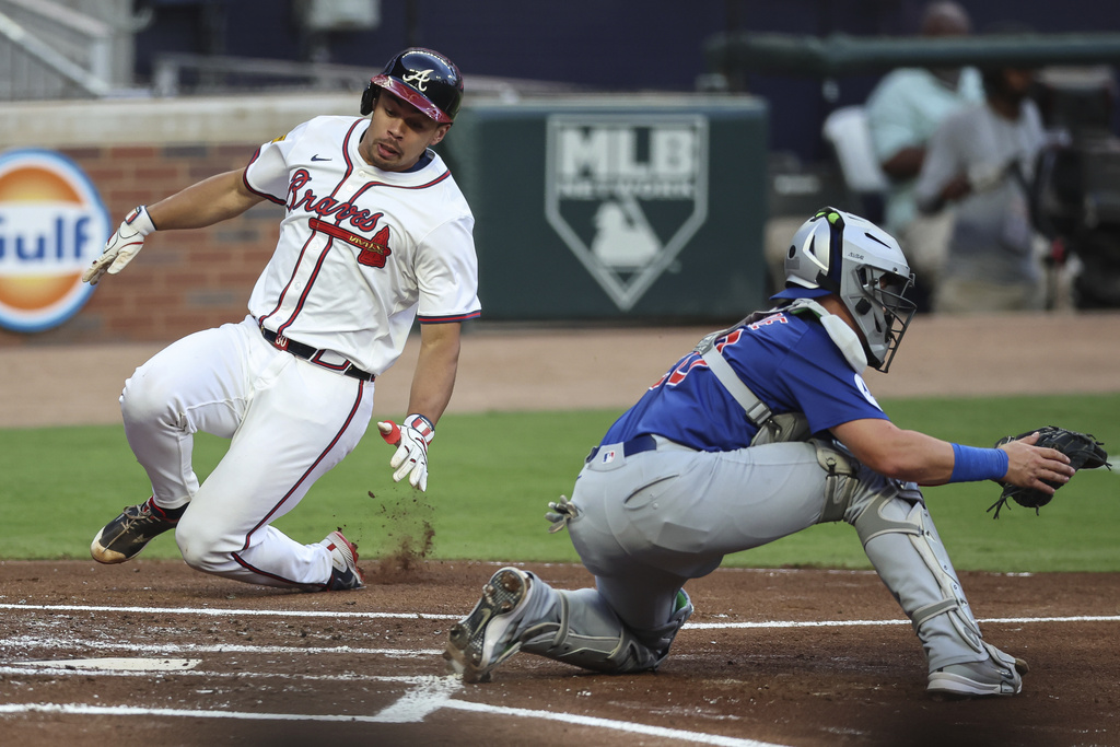 Atlanta Braves' Drake Baldwin gets ready to tag home plate in the first inning of a baseball game against the Chicago Cubs, Monday, Sept. 8, 2025, in Atlanta. (AP Photo/Colin Hubbard)