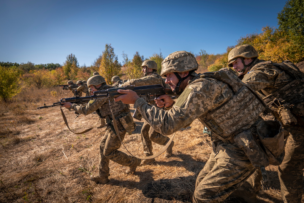 Ukrainian soldiers of the 66th Brigade attend a training combat exercise in Donetsk region, Ukraine, Thursday, Sept. 25, 2025. (AP Photo/Dan Bashakov)