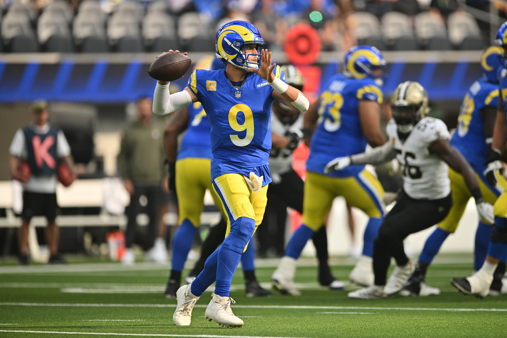 Los Angeles Rams quarterback Matthew Stafford (9) passes in the first half of an NFL football game against the New Orleans Saints Sunday, Nov. 2, 2025, in Inglewood, Calif. (AP Photo/Katie Chin)