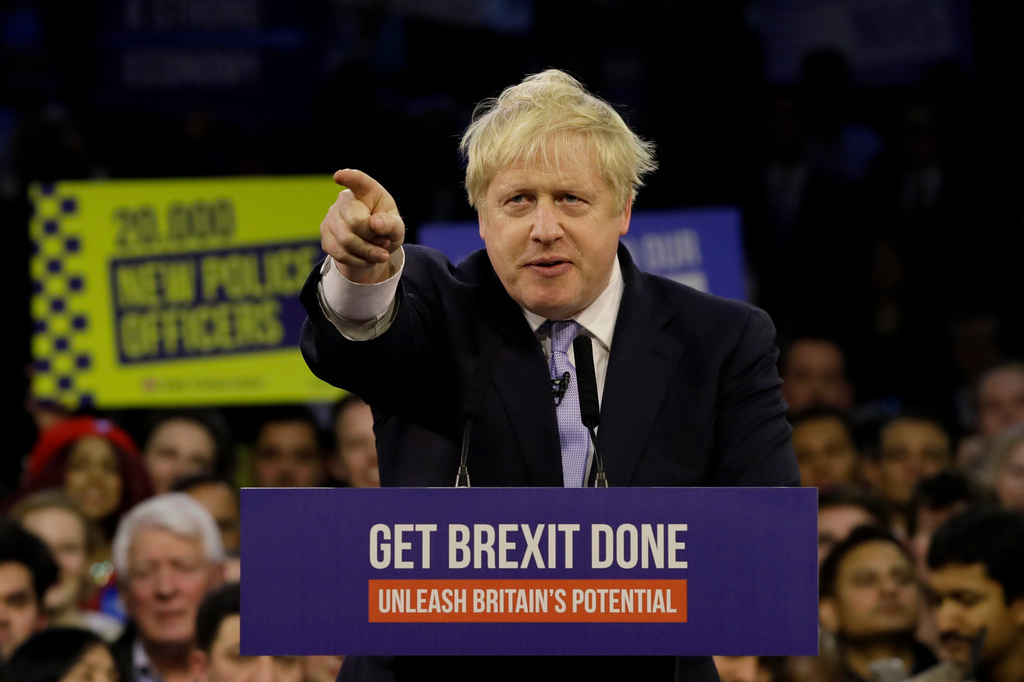 FILE - Britain's Prime Minister Boris Johnson speaks during his ruling Conservative Party's final election campaign rally at the Copper Box Arena in London, Wednesday, Dec. 11, 2019. (AP Photo/Kirsty Wigglesworth, File)