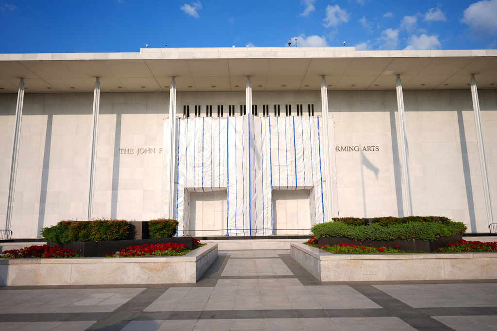 A tarp covers a portions of the signage at the John F. Kennedy Center for the Performing Arts, Thursday, Sept. 17, 2026 in Washington. (AP Photo/Pablo Martinez Monsivais)