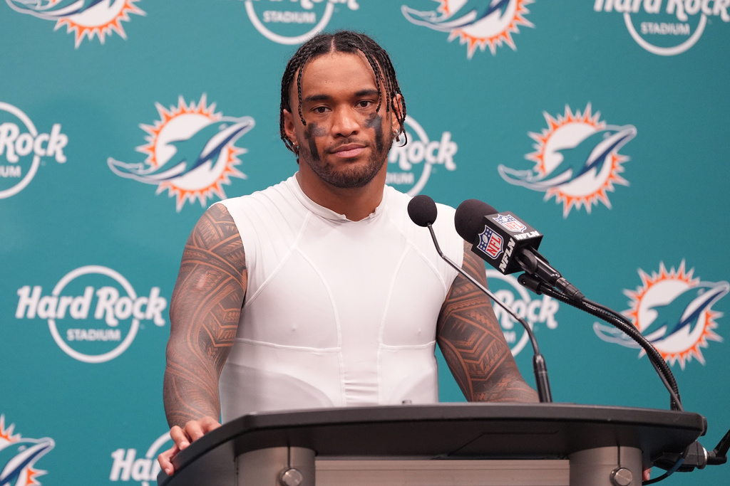 Miami Dolphins quarterback Tua Tagovailoa speaks at a news conference after the Los Angeles Chargers defeated the Dolphins 29-27 in an NFL football game Sunday, Oct. 12, 2025, in Miami Gardens, Fla. (AP Photo/Rebecca Blackwell)