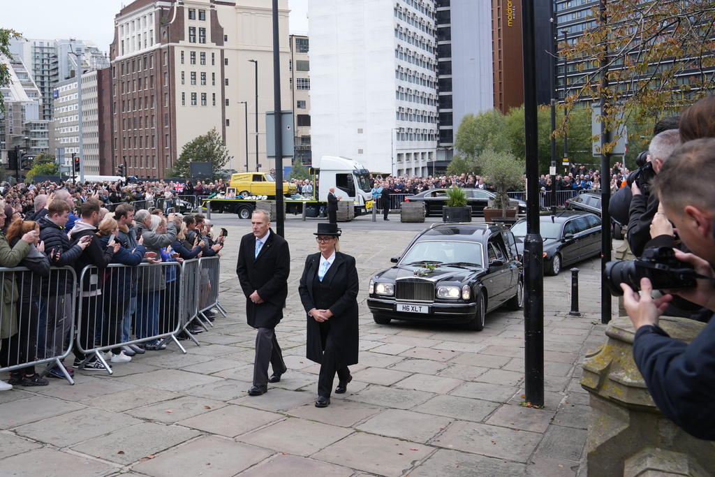 The funeral cortege for boxer Ricky Hatton arrives at Manchester cathedral for the service in Manchester, England, Friday, Oct. 10, 2025. (AP Photo/Jon Super)