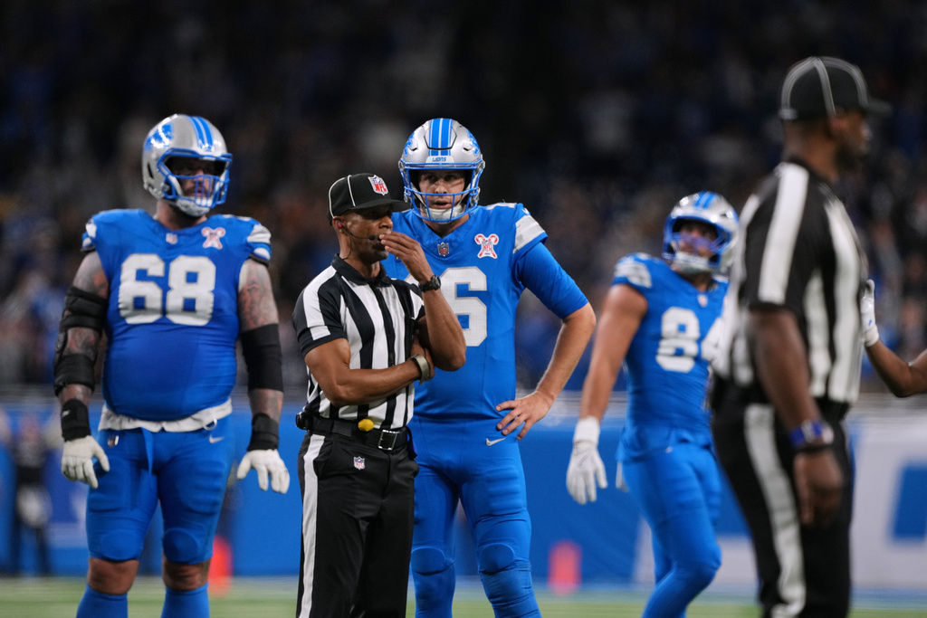 Detroit Lions' Jared Goff (16) waits for a call on the final play of an NFL football game against the Pittsburgh Steelers, Sunday, Dec. 21, 2025, in Detroit. (AP Photo/Ryan Sun)