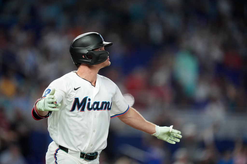 Miami Marlins' Griffin Conine runs after hitting a two-run home run during the eighth inning of a baseball game against the Philadelphia Phillies, Wednesday, July 29, 2026, in Miami. (AP Photo/Rebecca Blackwell).