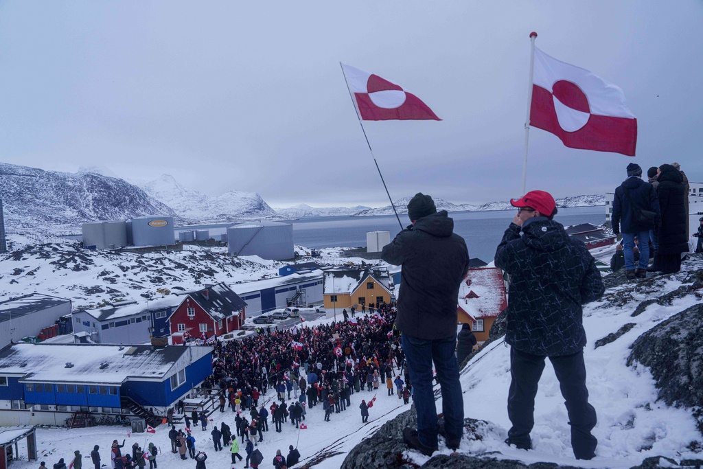 People protest against Trump's policy towards Greenland in front of US consulate in Nuuk, Greenland, Saturday, Jan. 17, 2026. (AP Photo/Evgeniy Maloletka)