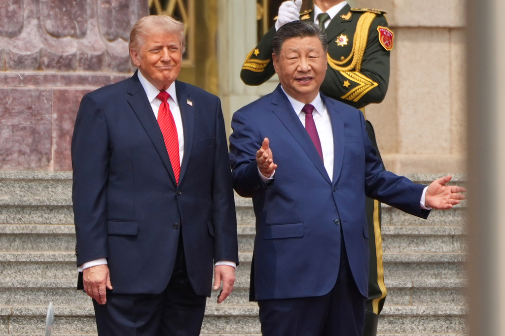 FILE - President Donald Trump, left, participates in a welcome ceremony with China's President Xi Jinping at the Great Hall of the People, May 14, 2026, in Beijing. (AP Photo/Mark Schiefelbein, File)