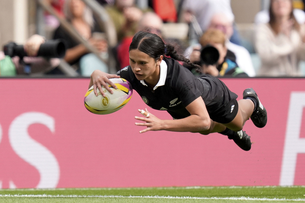New Zealand's Braxton Sorensen-McGee scores a try during the Women's Rugby World Cup bronze match between New Zealand and France at the Allianz Stadium, Twickenham, London, Saturday, Sept. 27, 2025. (Andrew Matthews/PA via AP)