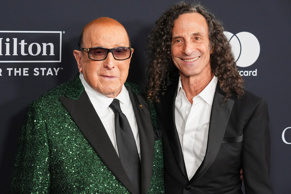 FILE - Clive Davis, left, and Kenny G arrive at the Pre-Grammy Gala in Beverly Hills, Calif., on Jan. 31, 2026. (AP Photo/Chris Pizzello, File)