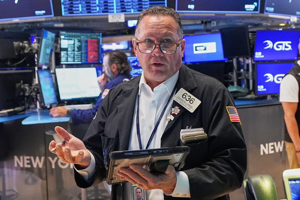 Trader Edward Curran works on the floor of the New York Stock Exchange, Friday, June 26, 2026. (AP Photo/Richard Drew)