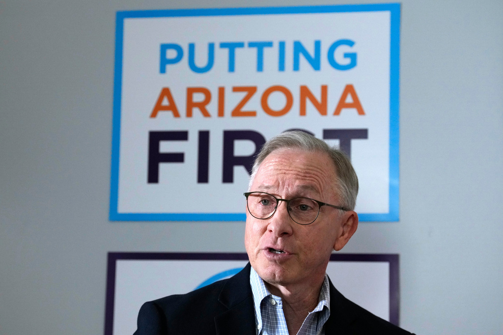 Runing mate for Democratic Arizona Gov. Katie Hobbs, Lieutenant Governor John Giles, the former Republican Mesa, Ariz., mayor, answers a question, Monday, Aug. 10, 2026, in Phoenix. (AP Photo/Ross D. Franklin)