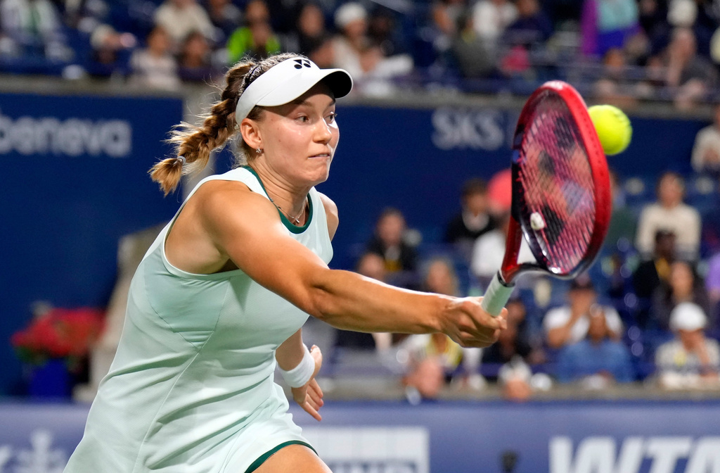 Kazakhstan's Elena Rybakina hits a forehand against USA's Coco Gauff during a National Bank Open semi final tennis match in Toronto, Wednesday, August 12, 2026. (Chris Young/The Canadian Press via AP)