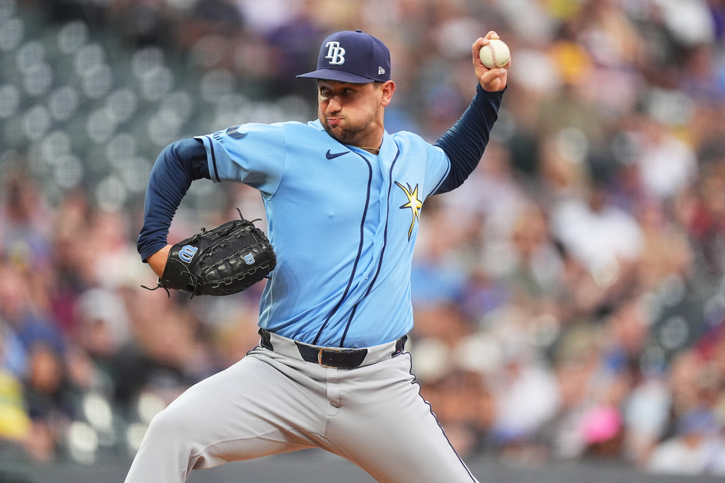 Tampa Bay Rays starting pitcher Ian Seymour works against the Colorado Rockies in the first inning of a baseball game Monday, Aug. 3, 2026, in Denver. (AP Photo/David Zalubowski)