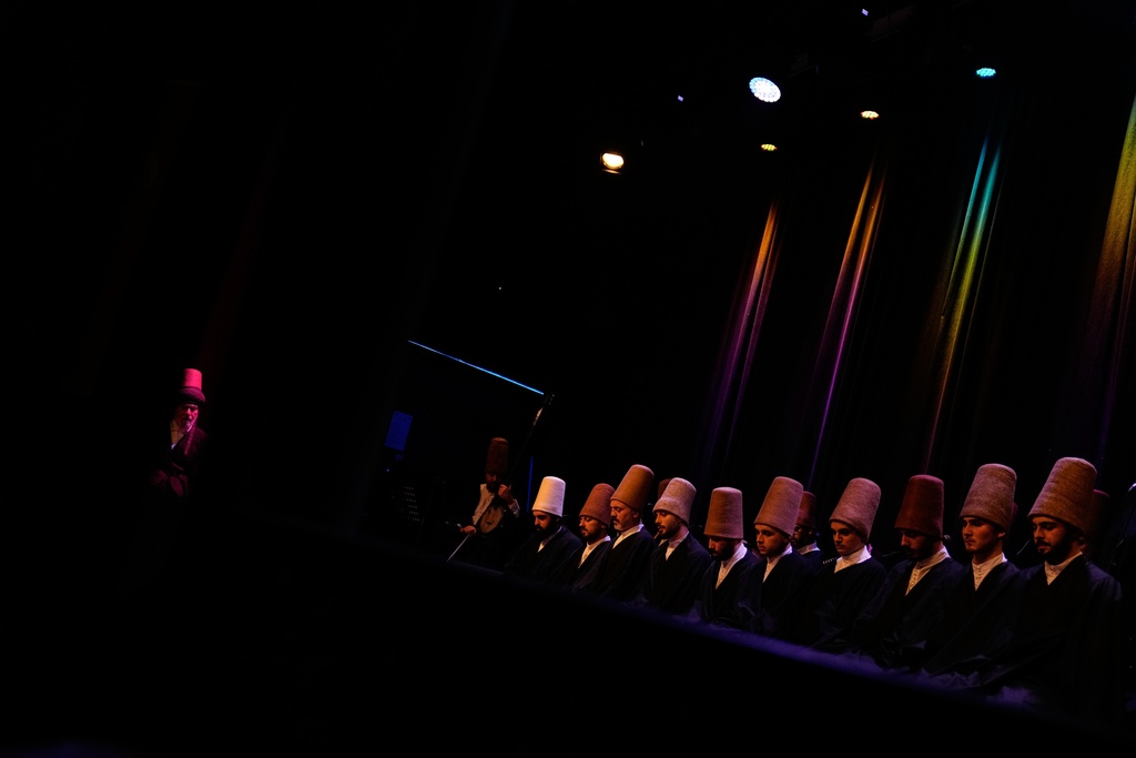 Whirling dervishes of the Mevlevi order perform during a Sheb-i Arus ceremony at a municipality cultural center in Istanbul, Turkey, Wednesday, Dec. 17, 2025, to commemorate the death of 13th century Islamic scholar, poet and Sufi mystic Jalaladdin Rumi.(AP Photo/Khalil Hamra)