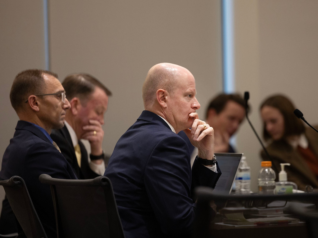 Prosecutor Chad Grunander, center, listens, Friday, March. 13, 2026, in 4th District Court in Provo, Utah, during a hearing for Tyler Robinson, who is accused in the fatal shooting of conservative activist Charlie Kirk. (Laura Seitz/The Deseret News via AP, Pool)