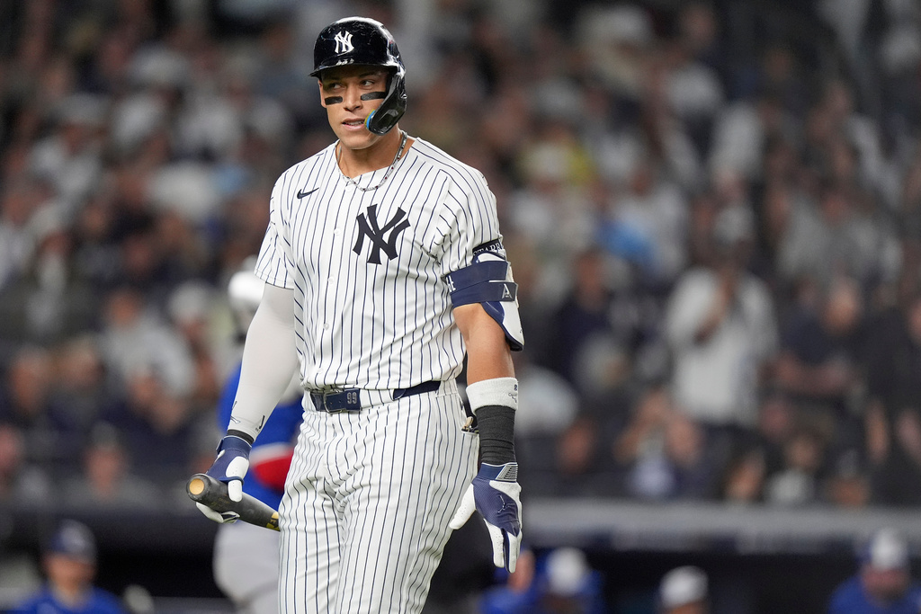 New York Yankees' Aaron Judge reacts after lining out against the Toronto Blue Jays during the third inning of Game 4 of baseball's American League Division Series, Wednesday, Oct. 8, 2025, in New York. (AP Photo/Frank Franklin II)