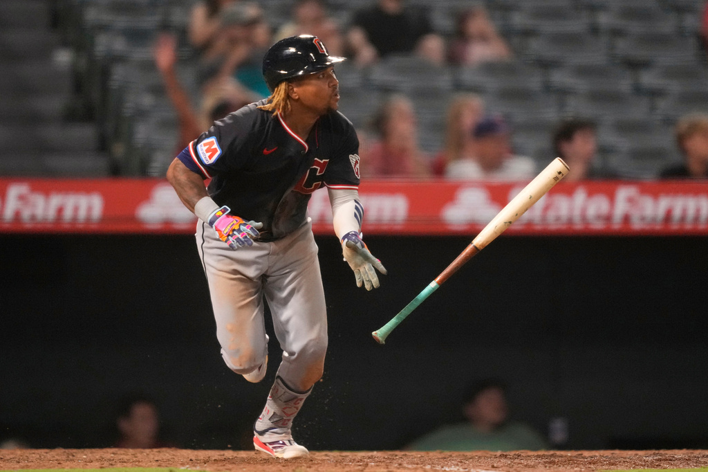 Cleveland Guardians' José Ramírez heads to first for an RBI double during the 10th inning of a baseball game against the Los Angeles Angels, Tuesday, Aug. 25, 2026, in Anaheim, Calif. (AP Photo/Mark J. Terrill)