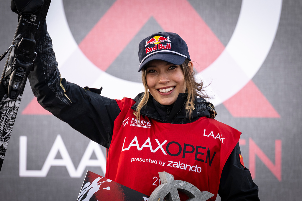 Ailing Eileen Gu of China celebrates winning the final run of the Freeski Slopestyle World Cup at Laax Open, Saturday, Jan. 17, 2026, in Laax, Switzerland. (Andreas Becker/Keystone via AP)
