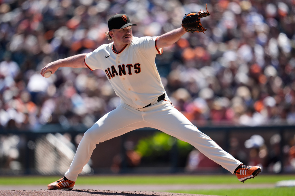 San Francisco Giants pitcher Logan Webb throws against the New York Mets during the first inning of a baseball game in San Francisco, Sunday, April 5, 2026. (AP Photo/Jeff Chiu)