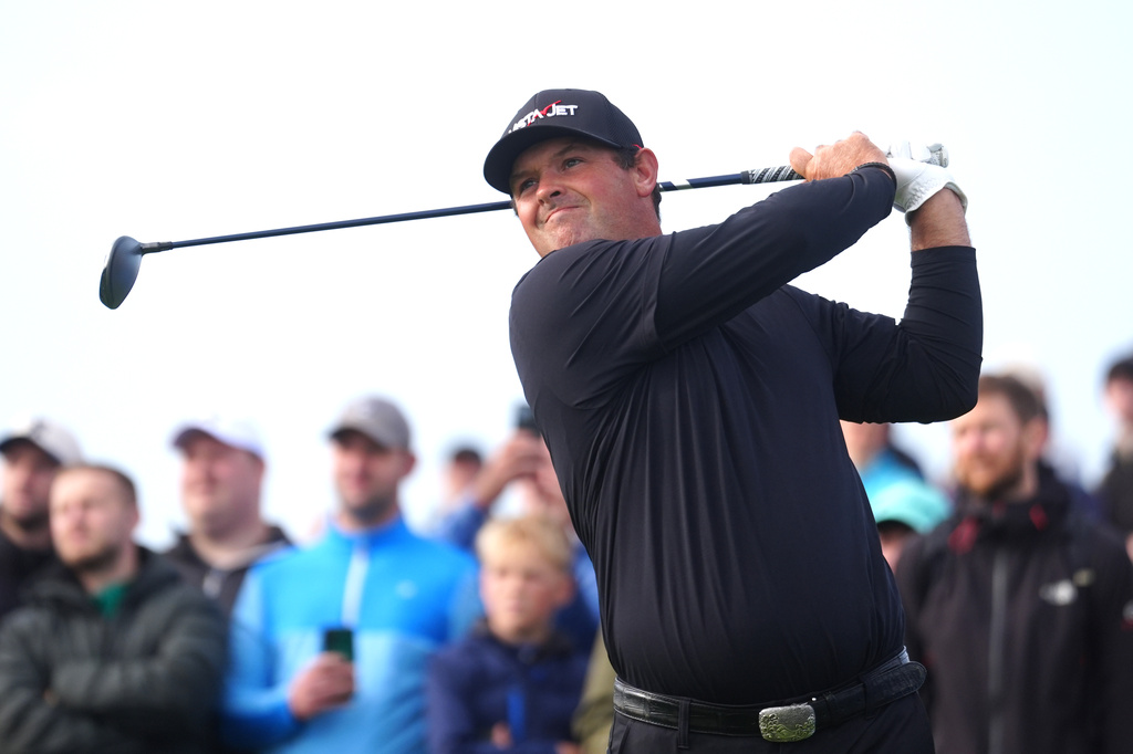 Patrick Reed of the United States tees off the 2nd on day two of the Irish Open at Trump International Golf Links in Doonbeg, Ireland, Friday Sept. 11, 2026. (Brian Lawless/PA via AP)