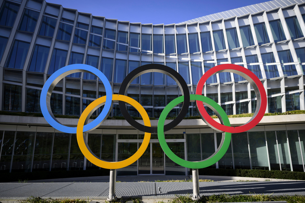 FILE - Olympic Rings are pictured in front of The Olympic House, headquarters of the International Olympic Committee (IOC) at the opening of the executive board meeting of the International Olympic Committee (IOC) in Lausanne, Switzerland, on March 28, 2023. (Laurent Gillieron/Keystone via AP, File)