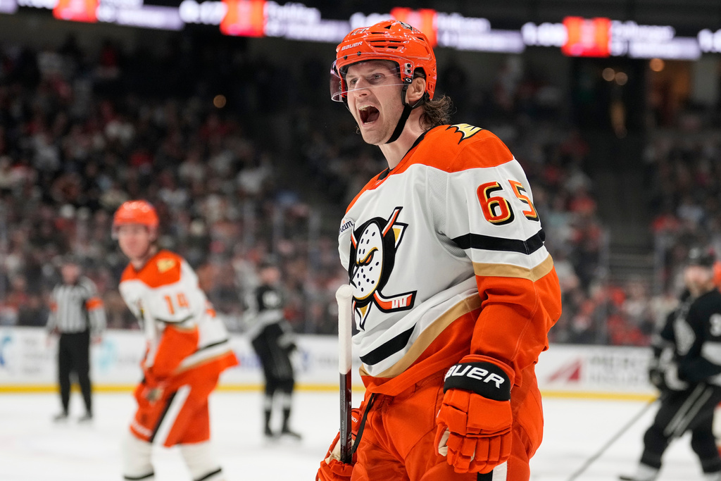 Anaheim Ducks defenseman Jacob Trouba complains to a referee after being called for a slashing penalty during the second period of an NHL hockey game against the Los Angeles Kings, Saturday, Jan. 17, 2026, in Anaheim, Calif. (AP Photo/Mark J. Terrill)