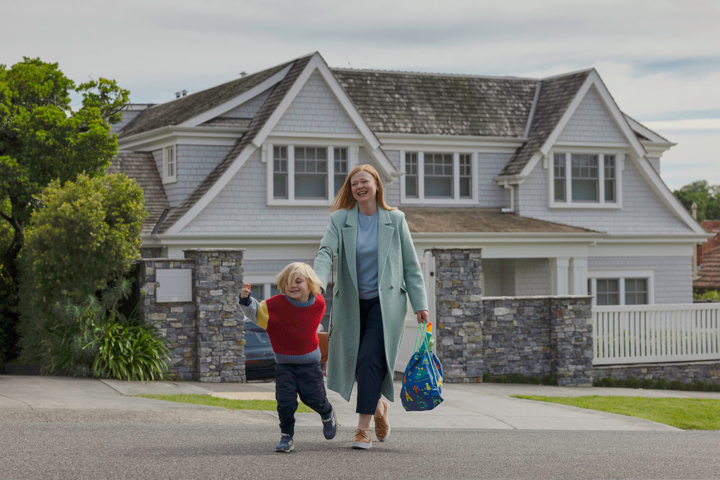This image released by Peacock shows Duke McCloud, left, and Sarah Snook in a scene from "All Her Fault." (Sarah Enticknap/Peacock via AP)