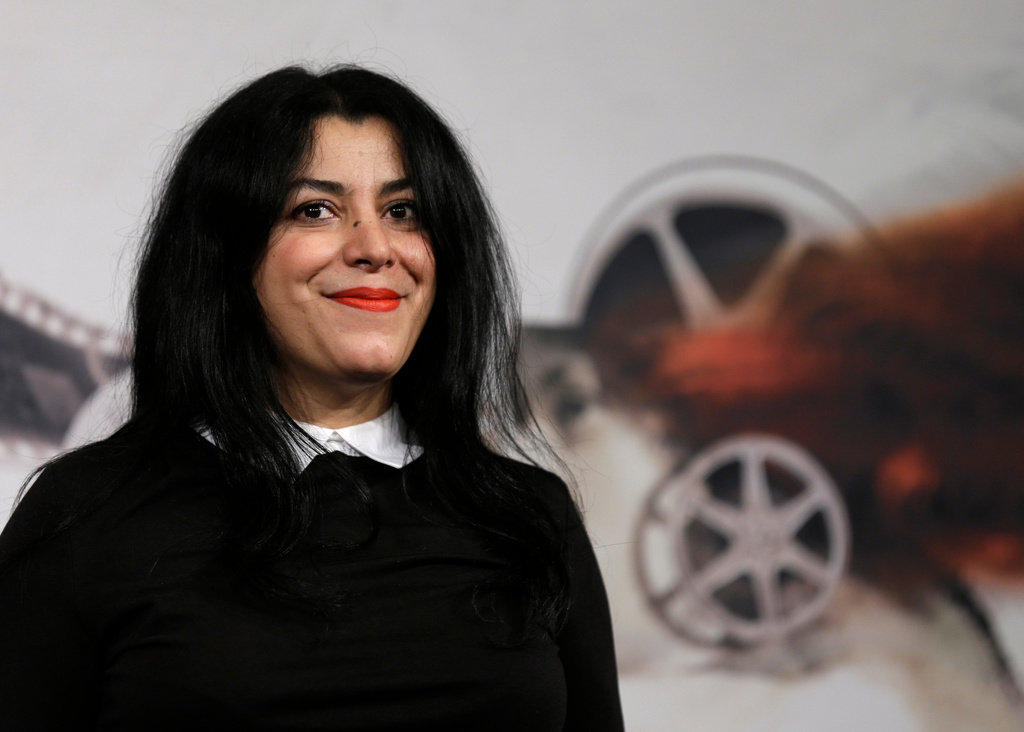 FILE - Director, illustrator and author Marjane Satrapi poses for photographers as she arrives to present the movie "La Bande des Jotas" at the 7th edition of the Rome International Film Festival in Rome, on Nov. 16, 2012. (AP Photo/Alessandra Tarantino, File)