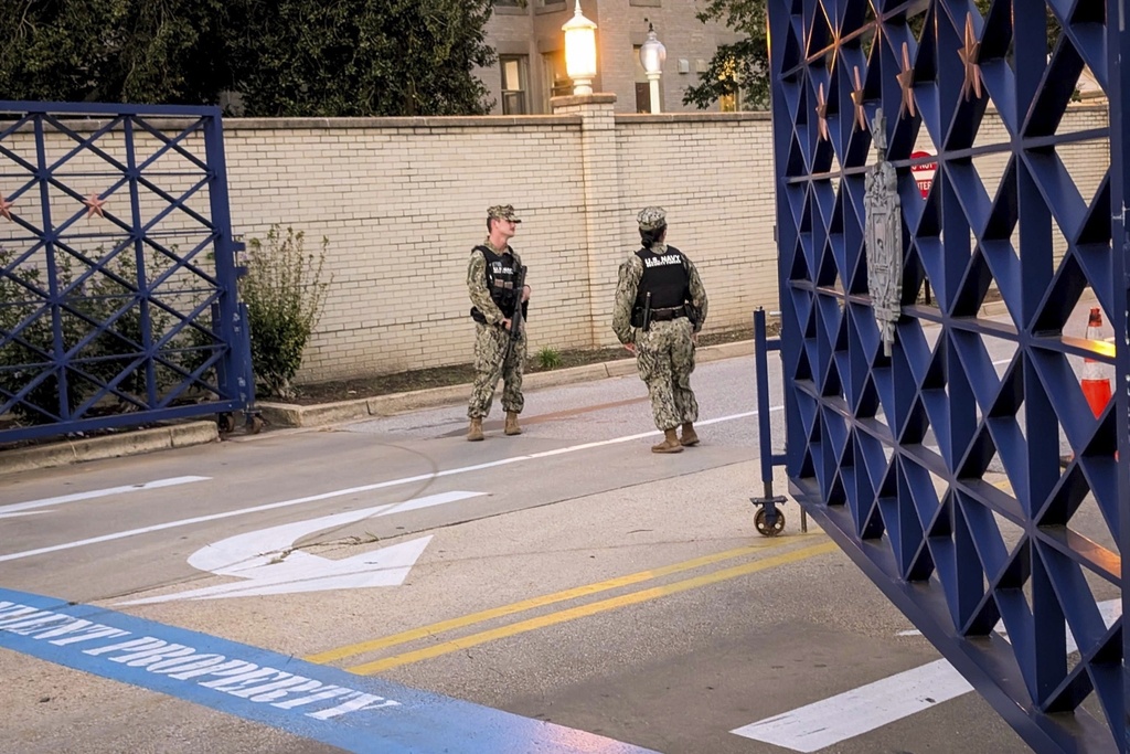 U.S. Navy Security Forces stand on duty at the U.S. Naval Academy in Annapolis, Md., Thursday, Sept. 11, 2025. (Rick Hutzell/The Baltimore Banner via AP)