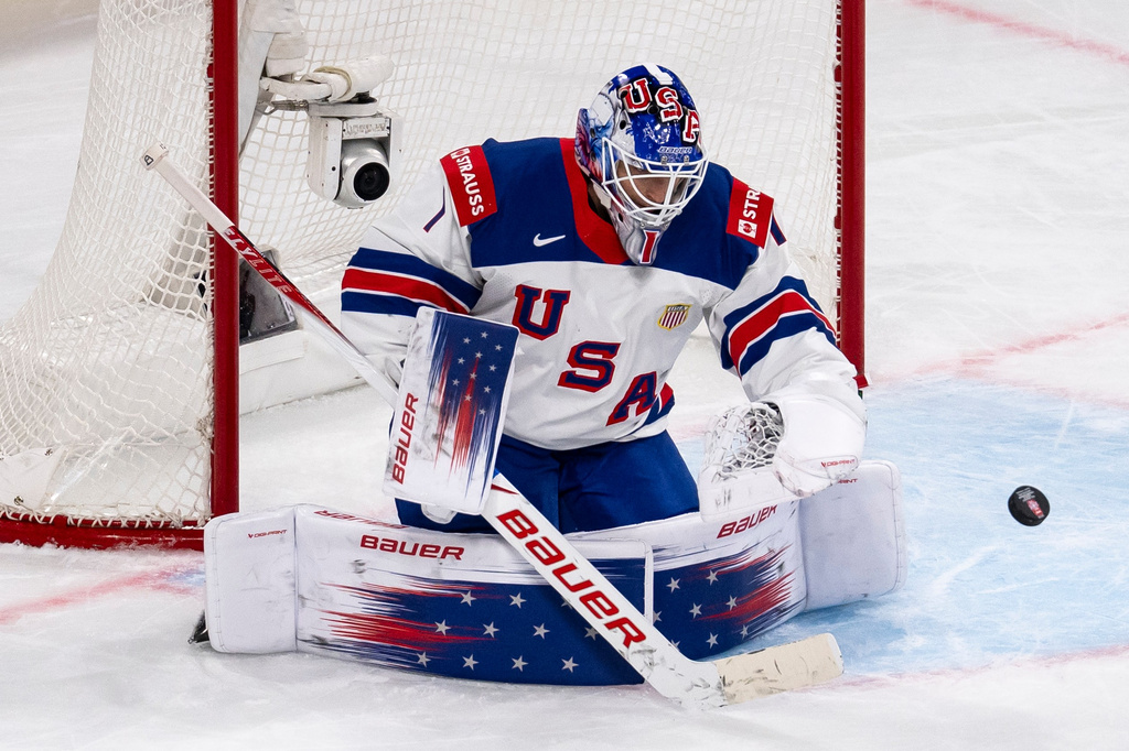 USA's goaltender Devin Cooley during the 2026 IIHF Men's Ice Hockey World Championship preliminary round group A match between Latvia and the United States in Zurich, Switzerland, Saturday, May 23, 2026. (Andreas Becker/Keystone via AP)