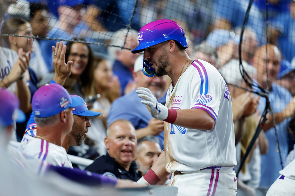 Kansas City Royals' Vinnie Pasquantino celebrates after hitting a home run during the sixth inning of a baseball game against the Detroit Tigers in Kansas City, Mo., Friday, Aug. 21, 2026. (AP Photo/Colin E. Braley)