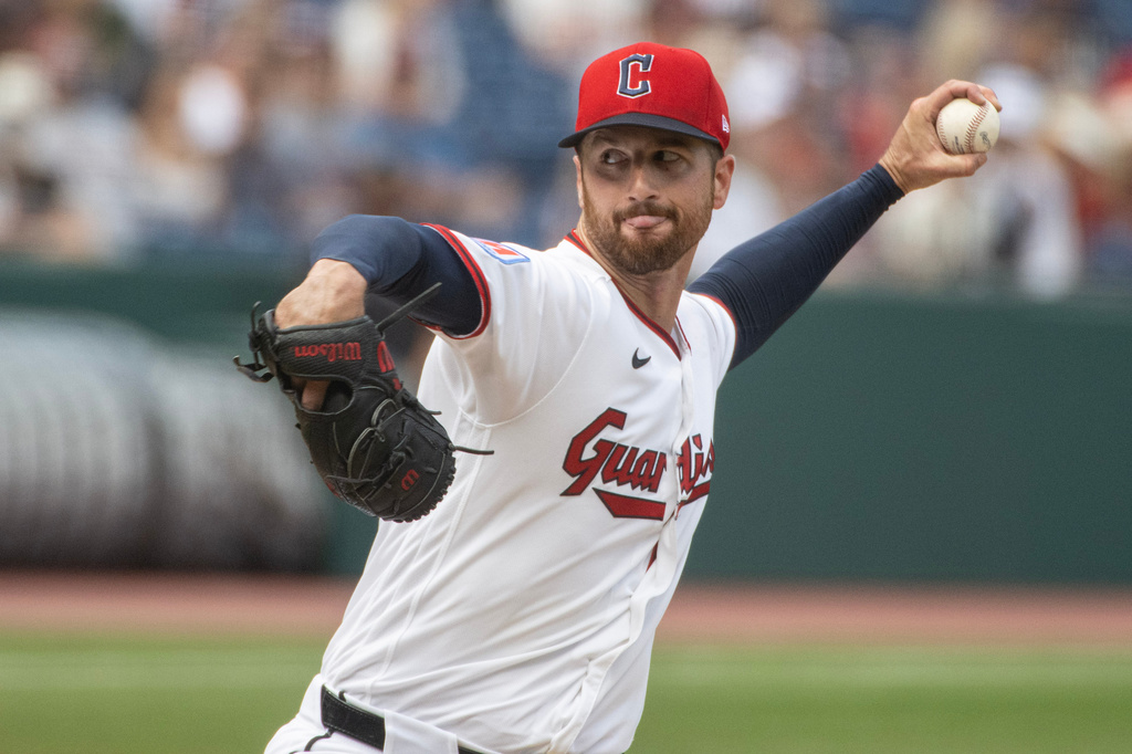Cleveland Guardians starting pitcher Foster Griffin delivers against the New York Mets during the first inning of a baseball game, Thursday, Aug. 6, 2026, in Cleveland. (AP Photo/Phil Long)
