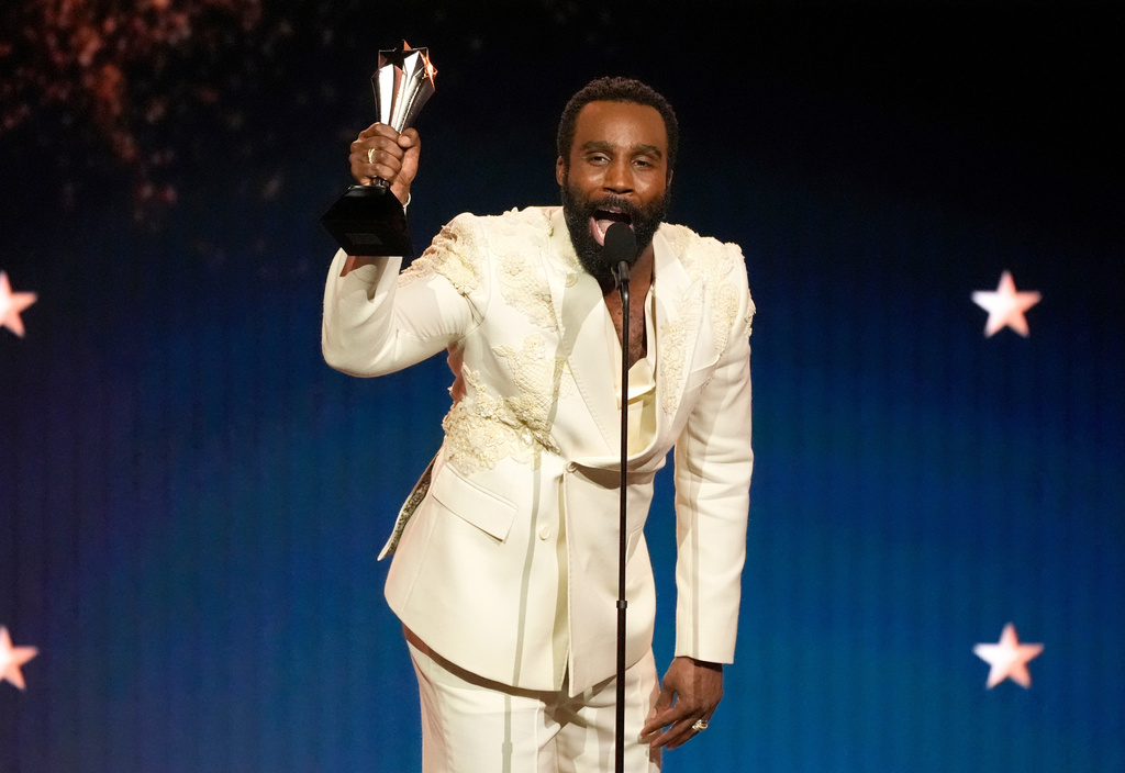 Tramell Tillman accepts the award for best supporting actor in a drama series for "Severance" during the 31st Annual Critics Choice Awards on Sunday, Jan. 4, 2026, at The Barker Hanger in Santa Monica, Calif. (AP Photo/Chris Pizzello)