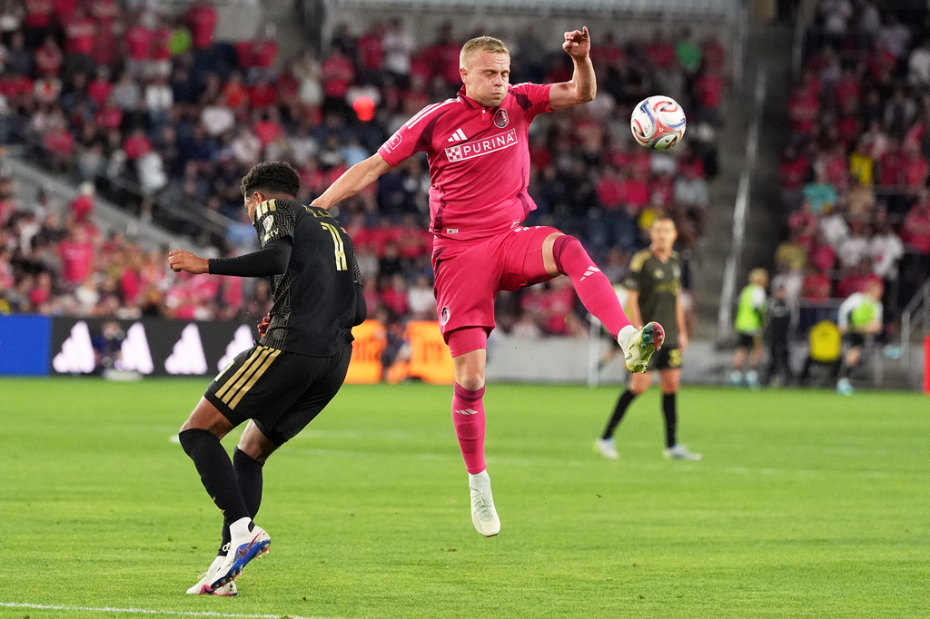 St. Louis City's Tomas Totland, right, and Los Angeles FC's Timothy Tillman battle for the ball during the first half of an MLS soccer match Wednesday, May 13, 2026, in St. Louis. (AP Photo/Jeff Roberson)