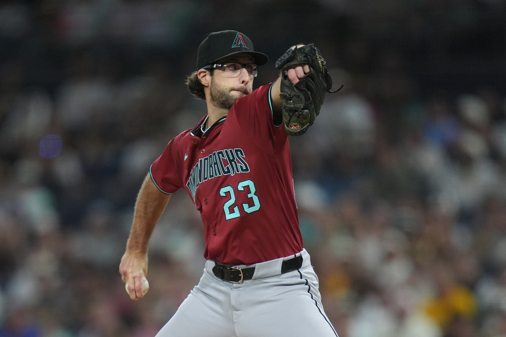 Arizona Diamondbacks starting pitcher Zac Gallen works against a San Diego Padres batter during the first inning of a baseball game Friday, Sept. 26, 2025, in San Diego. (AP Photo/Gregory Bull)