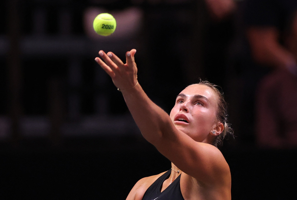 Aryna Sabalenka serves against Nick Kyrgios during their Battle of the Sexes tennis match, in Dubai, United Arab Emirates, Sunday Dec. 28, 2025. (Amr Alfiky/Pool Photo via AP)