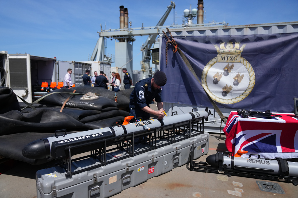 UK Royal Navy personnel inspect autonomous vehicles with sonar sensor that can detect and identify mines, on RFA Lyme Bay, in British Overseas Territory of Gibraltar, on Friday, May 22, 2026. (AP Photo/Kwiyeon Ha) CORRECTION: Location corrected to British Overseas Territory of Gibraltar, instead of territory of Gibraltar