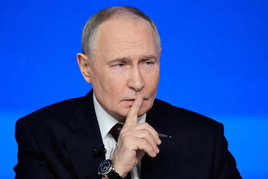 Russian President Vladimir Putin gestures while speaking during his annual news conference and call-in show at Gostinny Dvor, in Moscow, on Friday, Dec. 19, 2025. (AP Photo/Pavel Bednyakov)