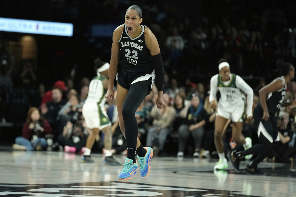 Las Vegas Aces center A'ja Wilson (22) celebrates after a play against the Seattle Storm during the first half of Game 3 in the first round of the WNBA basketball playoffs Thursday, Sept. 18, 2025, in Las Vegas. (AP Photo/John Locher)