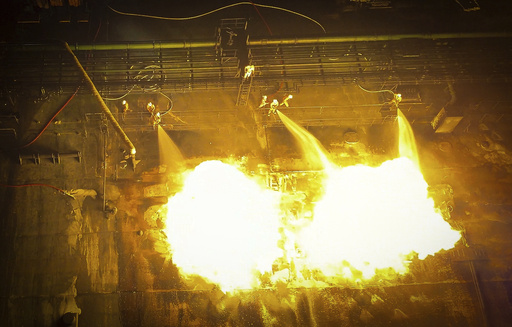 This undated photo released by the private security firm Ambrey shows firefighters aboard the oil tanker Sounion burning in the Red Sea. (Ambrey via AP) This undated photo released by the private security firm Ambrey shows firefighters aboard the oil tanker Sounion burning in the Red Sea. (Ambrey via AP)