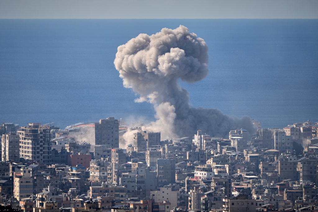 FILE - Smoke rises from an Israeli airstrike in Dahiyeh, Beirut's southern suburbs, March 9, 2026. (AP Photo/Hassan Ammar, File)