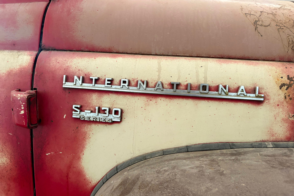 The make and series are displayed on the side of a 1956 International Harvester S-130 pickup truck in Mason, Ill., Sunday, May 24, 2026. (AP Photo/Holly Meyer)