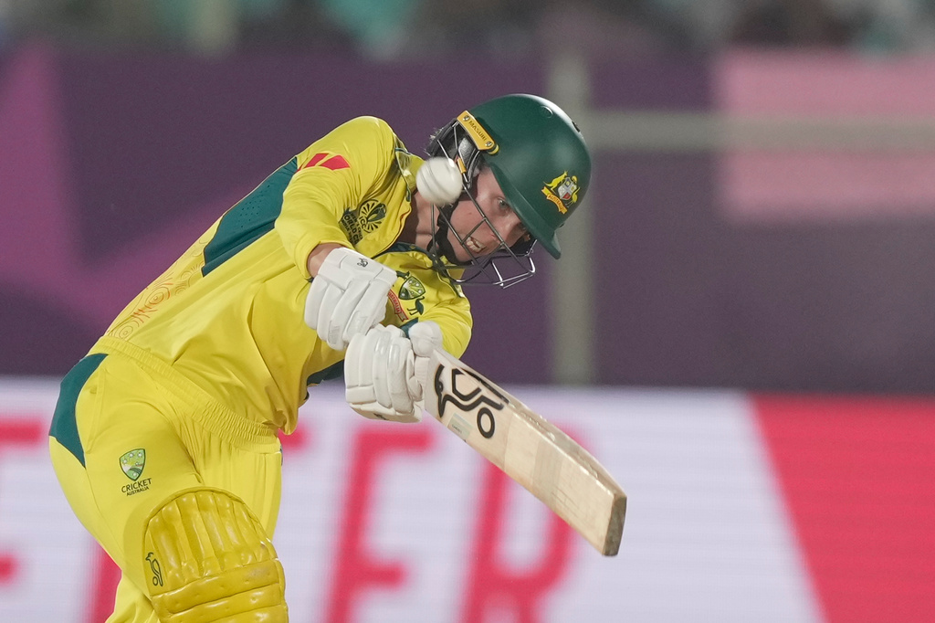 Australia's Phoebe Litchfield plays a shot during the ICC Women's Cricket World Cup match between Australia and Bangladesh at ACA–VDCA Cricket Stadium in Visakhapatnam, India, Thursday, Oct. 16, 2025. (AP Photo/Mahesh Kumar A.)