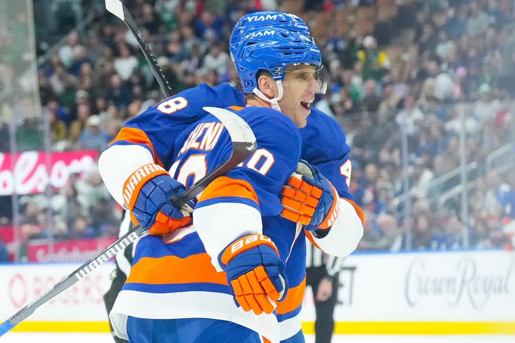 New York Islanders' Brayden Schenn celebrates his goal against the Toronto Maple Leafs during the first period of an NHL hockey game in Toronto, Tuesday March 17, 2026. (Chris Young/The Canadian Press via AP)
