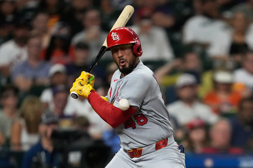 St. Louis Cardinals designated hitter Iván Herrera is hit by a pitch from Houston Astros starting pitcher Peter Lambert during the third inning of a baseball game in Houston, Friday, April 17, 2026. (AP Photo/Ashley Landis)