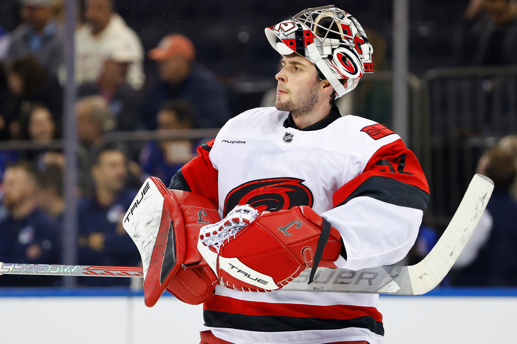 FILE - Carolina Hurricanes goaltender Pyotr Kochetkov (52) during the second period of an NHL hockey game against the New York Rangers, Tuesday Nov. 4, 2025, in New York. (AP Photo/Noah K. Murray, File)