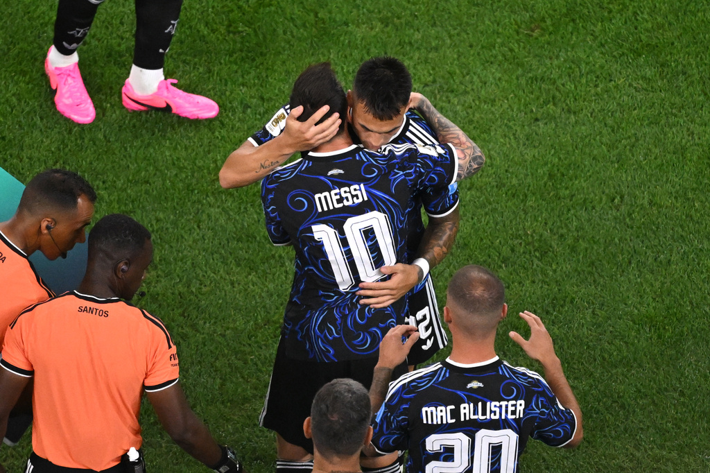 Argentina's Lautaro Martinez (22) is substituted by Lionel Messi (10) during the World Cup Group J soccer match between Jordan and Argentina in Arlington, Texas, near Dallas, Saturday, June 27, 2026. (AP Photo/Jessica Tobias)